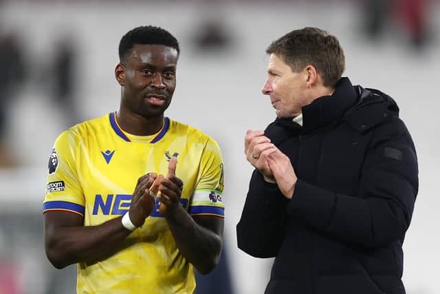 Crystal Palace defender Marc Guehi and manager Oliver Glasner salute the fans after beating West Ham in the Premier League | Bryn Lennon/Getty Images