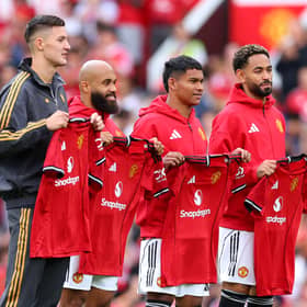 New signings Bryan Mbeumo, Benjamin Sesko, Diego Leon and Matheus Cunha pose for Manchester United at Old Trafford | Molly Darlington/Getty Images