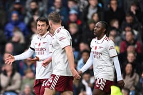 Viktor Gyokeres celebrates with Martin Zubimendi Eberech Eze after his Premier League goal against Burnley | Stuart MacFarlane/Arsenal FC via Getty Images