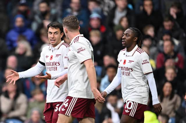 Viktor Gyokeres celebrates with Martin Zubimendi Eberech Eze after his Premier League goal against Burnley | Stuart MacFarlane/Arsenal FC via Getty Images
