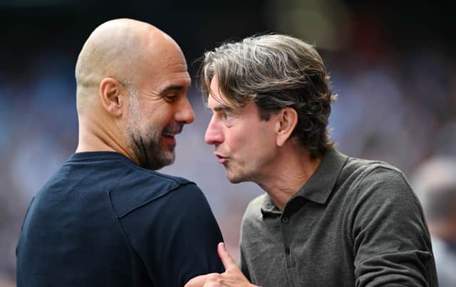 Pep Guardiola and Thomas Frank embrace ahead of the Premier League match between Manchester City and Tottenham Hotspur | Clive Mason/Getty Images