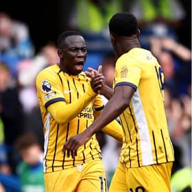 Yankuba Minteh celebrates after scoring for Brighton & Hove Albion in the Premier League, but could he joining Arne Slot at Liverpool in the January transfer window? | National World / Getty Images