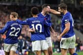 Defenders Michael Keane and James Tarkowski celebrate with Iliman Ndiaye after Everton scored against Fulham in the Premier League | Michael Regan/Getty Images
