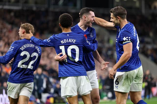Defenders Michael Keane and James Tarkowski celebrate with Iliman Ndiaye after Everton scored against Fulham in the Premier League | Michael Regan/Getty Images