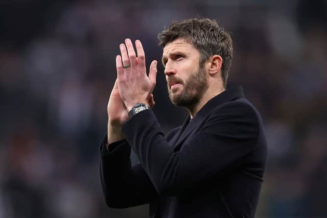 Michael Carrick applauds the Manchester United fans