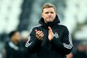 Eddie Howe applauds the Newcastle fans after a match