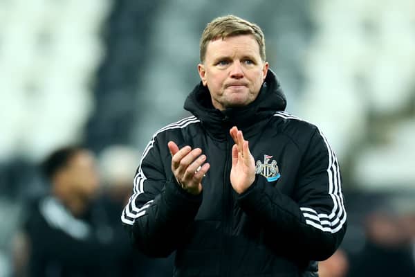 Eddie Howe applauds the Newcastle fans after a match