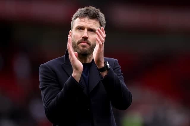 Michael Carrick applauds the Manchester United fans