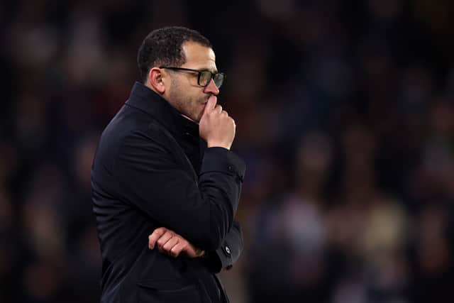 Liam Rosenior strikes a pensive pose on the Chelsea touchline