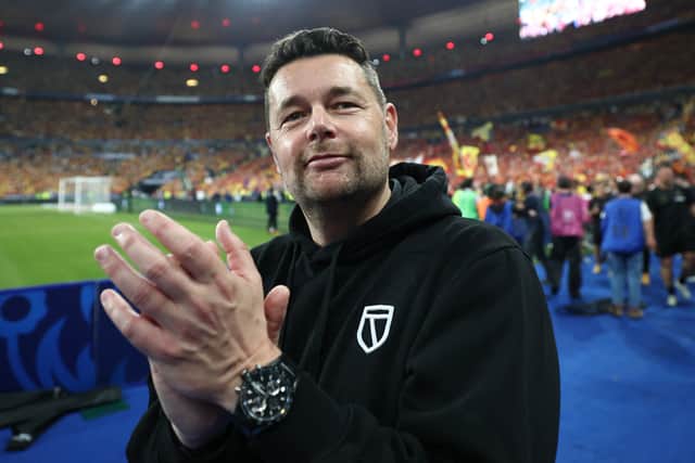 Pierre Sage celebrates Lens' Coupe de France victory.