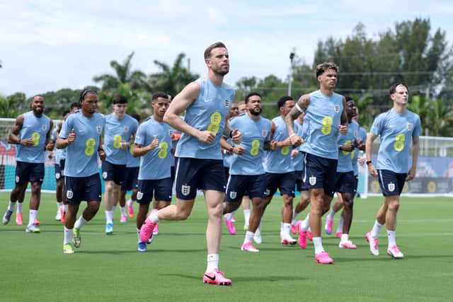Jordan Henderson leads the England squad through a warm-weather run