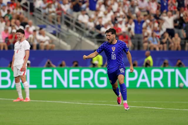 Como and Croatia star Martin Baturina is attracting some Premier League interest