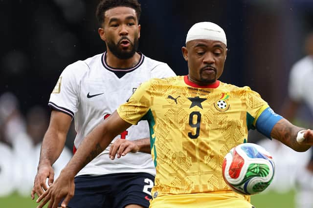 Reece James tussles with Jordan Ayew during the 0-0 draw with Ghana