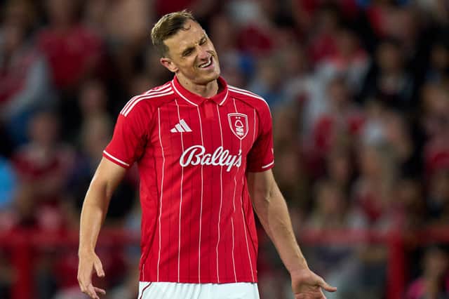 Chris Wood sporting the 2025/26 home kit