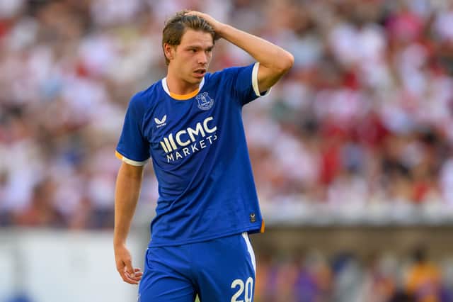 Tyler Dibling models the new Everton home kit during a pre-season match
