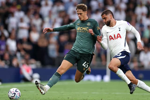 Harrison Armstrong outmuscles Rodrigo Bentancur during Saturday's drab 0-0 draw