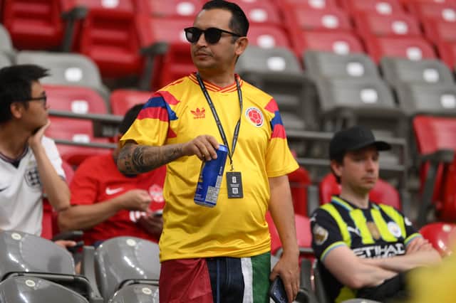 Football fans can drink in the stands in many countries - this Colombia fan was enjoying a beer during the 2026 World Cup