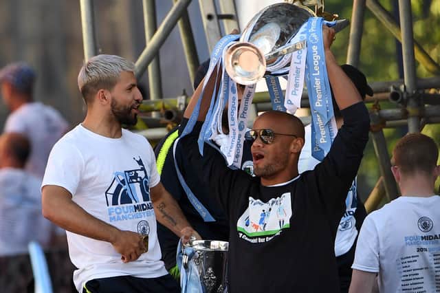 Vincent Kompany lifts the Premier League title in 2019 - one of a number of trophies won during the period the charges pertain to