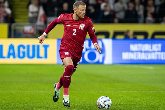 Matty Cash in action for Poland - before he suffered a game-ending injury