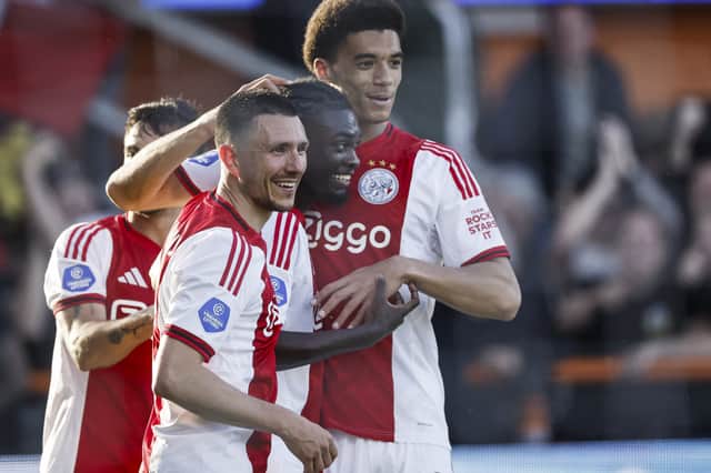 Bouwman towers over his Ajax team-mates during a match in May