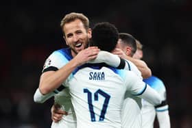 Harry Kane of England (L) celebrates with teammates Bukayo Saka (C) and Phil Foden after scoring during England's Euro 2024 qualifying campaign (Picture: Catherine Ivill/Getty Images)