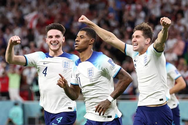 Marcus Rashford of England celebrates after scoring their team's first goal during the FIFA World Cup Qatar 2022 Group B match between Wales and England at Ahmad Bin Ali Stadium (Photo by Francois Nel/Getty Images)