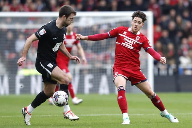 ON THE UP: Middlesbrough's Hayden Hackney battles for the ball with Birmingham City's Gary Gardner at the Riverside earlier this season Picture: Will Matthews/PA