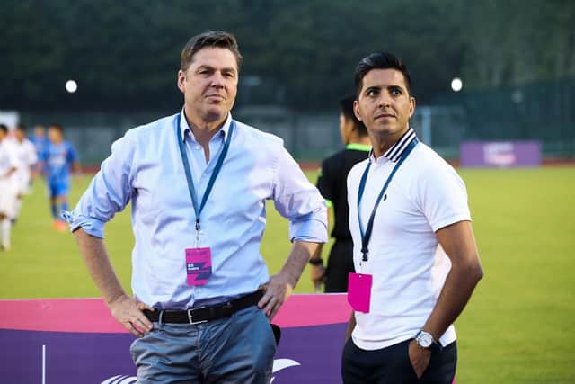 NANJING, CHINA - JULY 15:  Richard Masters (L) Premier League Interim Chief Executive, with Manish Bhasin, presenter PLP attend the finals the of CSL Cup Youth Tournament match between Jiangsu Suning and Shanghai Shenhua at Jiangsu FA Training Complex on July 15, 2019 in Nanjing, China.  (Photo by Lintao Zhang/Getty Images for Premier League)
