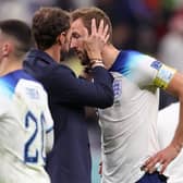 TIME NEEDED: England boss Gareth Southgate consoles Harry Kane after Saturday night's 2-1 defeat to France in the Qatar World Cup quarter-finals. 
Photo by Julian Finney/Getty Images.