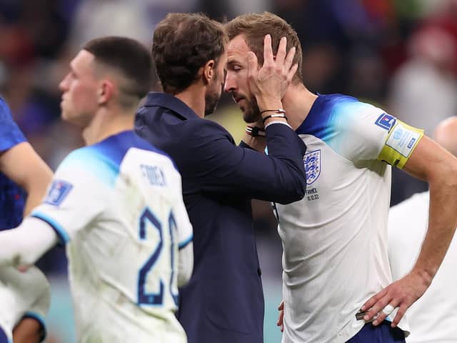 TIME NEEDED: England boss Gareth Southgate consoles Harry Kane after Saturday night's 2-1 defeat to France in the Qatar World Cup quarter-finals. 
Photo by Julian Finney/Getty Images.