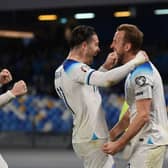 NAPLES, ITALY - MARCH 23: Harry Kane of England celebrates with team mates Luke Shaw and Jack Grealish of England after scoring their sides second goal during the UEFA EURO 2024 qualifying round group C match between Italy and England at Stadio Diego Armando Maradona on March 23, 2023 in Naples, Italy. (Photo by Michael Regan/Getty Images)
