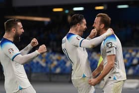 NAPLES, ITALY - MARCH 23: Harry Kane of England celebrates with team mates Luke Shaw and Jack Grealish of England after scoring their sides second goal during the UEFA EURO 2024 qualifying round group C match between Italy and England at Stadio Diego Armando Maradona on March 23, 2023 in Naples, Italy. (Photo by Michael Regan/Getty Images)