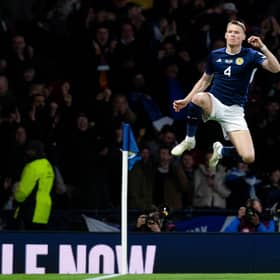 Scott McTominay celebrates making it 1-0 to Scotland during the European Championships qualifier against Spain. Picture: SNS
