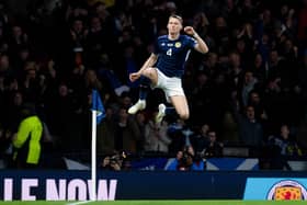 Scott McTominay celebrates making it 1-0 to Scotland during the European Championships qualifier against Spain. Picture: SNS