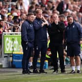 BLOWS: From Nottingham Forest boss Steve Cooper, centre, and his team during Saturday's 2-1 defeat at Brentford. Photo by Ryan Pierse/Getty Images.