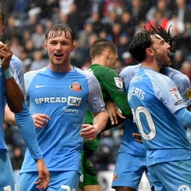 Sunderland players celebrate after scoring at Preston.