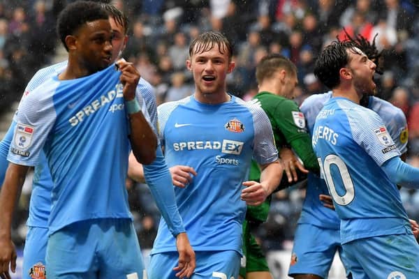 Sunderland players celebrate after scoring at Preston.