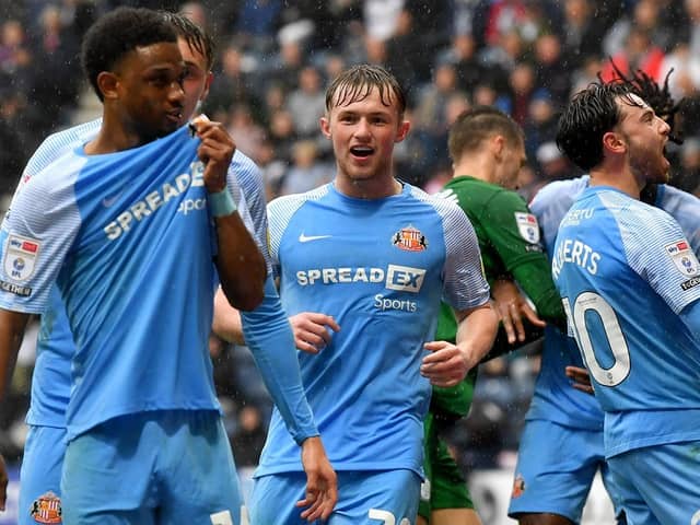 Sunderland players celebrate after scoring at Preston.