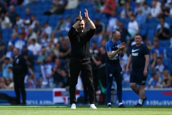 Roberto De Zerbi, Manager of Brighton & Hove Albion, applauds the fans during the warm up prior to the Premier League against Manchester United at American Express Community Stadium