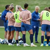 Sarina Wiegman, Head Coach of England, speaks to the players during a drinks break during an England Training Session at St Georges Park (Photo by Michael Regan/Getty Images)