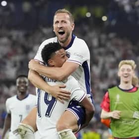 England's Harry Kane celebrates in the arms of team-mate Ollie Watkins at the end of a semifinal match between the Netherlands and England. (AP Photo/Martin Meissner).