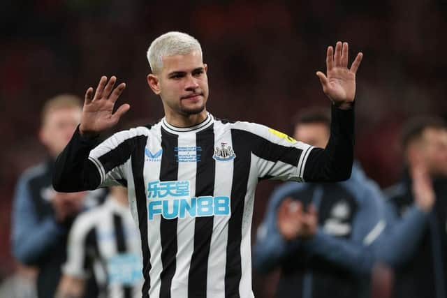 Newcastle United midfielder Bruno Guimaraes gestures to the fans after the final whistle.