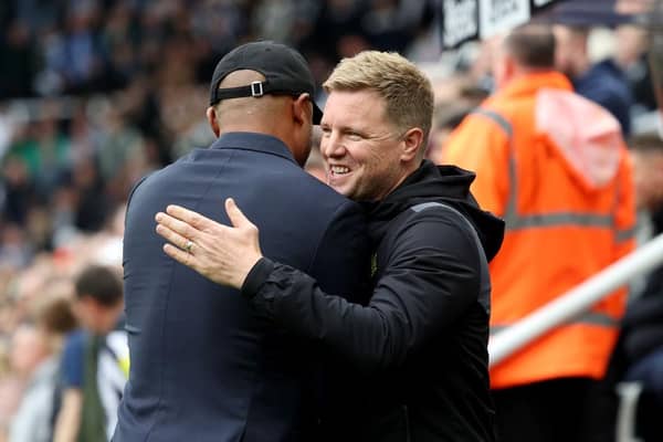 NEWCASTLE UPON TYNE, ENGLAND - SEPTEMBER 30:  Vincent Kompany, Manager of Burnley, embraces Eddie Howe, Manager of Newcastle United, prior to the Premier League match between Newcastle United and Burnley FC at St. James Park on September 30, 2023 in Newcastle upon Tyne, England. (Photo by Ian MacNicol/Getty Images)