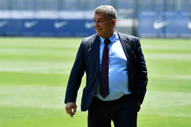 Barcelona's Spanish President Joan Laporta has been speaking about Raphinha (Photo by Pau BARRENA / AFP) (Photo by PAU BARRENA/AFP via Getty Images)