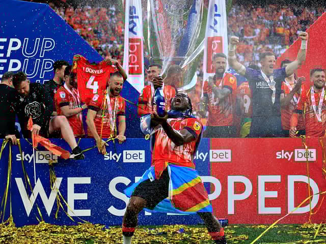Pelly-Ruddock Mpanzu celebrates Luton reaching the Premier League