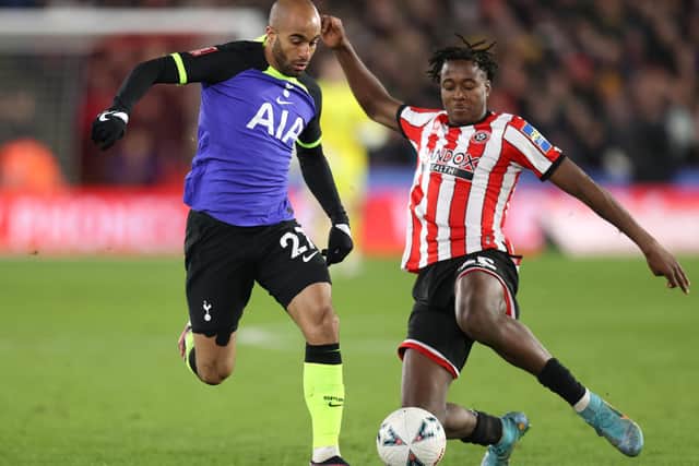 Lucas Moura of Tottenham Hotspur is closed down by Andre Brooks of Sheffield United: Alex Pantling/Getty Images
