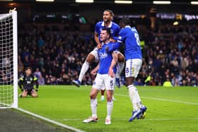 BURNLEY, ENGLAND - DECEMBER 16: Michael Keane of Everton (C) celebrates with teammates  Dominic Calvert-Lewin and Amadou Onana after scoring their team's second goal  during the Premier League match between Burnley FC and Everton FC at Turf Moor on December 16, 2023 in Burnley, England. (Photo by Marc Atkins/Getty Images)