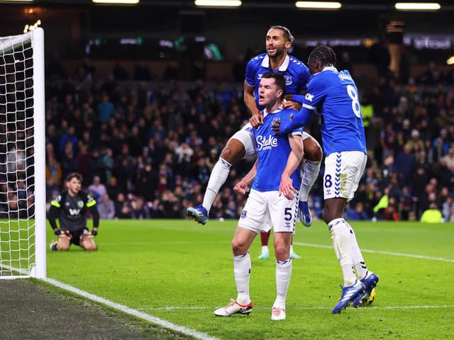 BURNLEY, ENGLAND - DECEMBER 16: Michael Keane of Everton (C) celebrates with teammates  Dominic Calvert-Lewin and Amadou Onana after scoring their team's second goal  during the Premier League match between Burnley FC and Everton FC at Turf Moor on December 16, 2023 in Burnley, England. (Photo by Marc Atkins/Getty Images)