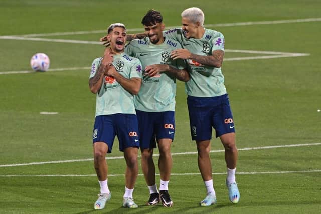 Bruno Guimaraes and Lucas Paqueta in training for Brazil during the World Cup (Photo by NELSON ALMEIDA/AFP via Getty Images)