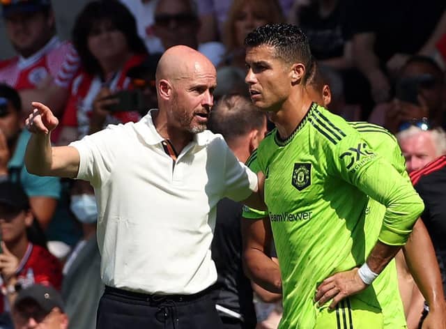 Cristiano Ronaldo and Manchester United manager Erik Ten Hag (Photo by ADRIAN DENNIS/AFP via Getty Images)